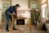 Handyman working on house